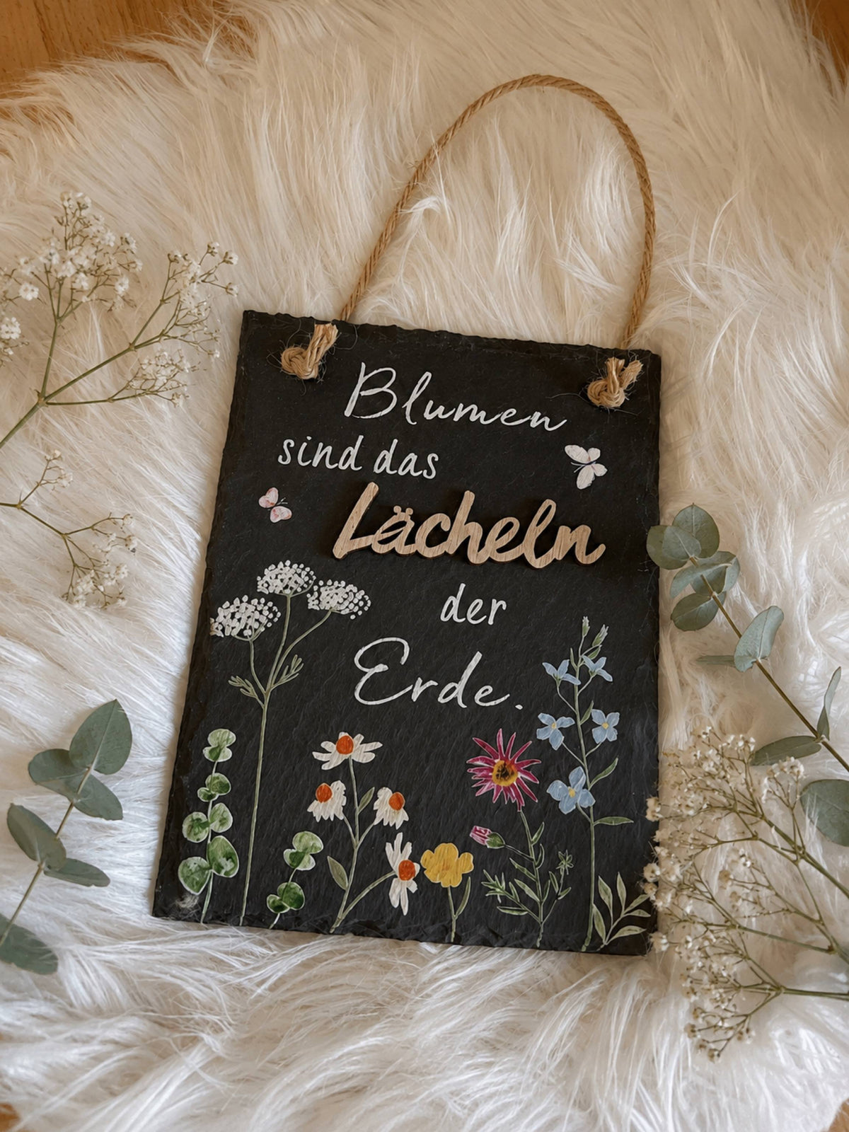 Schiefertafel „Blumen sind das Lächeln der Erde“