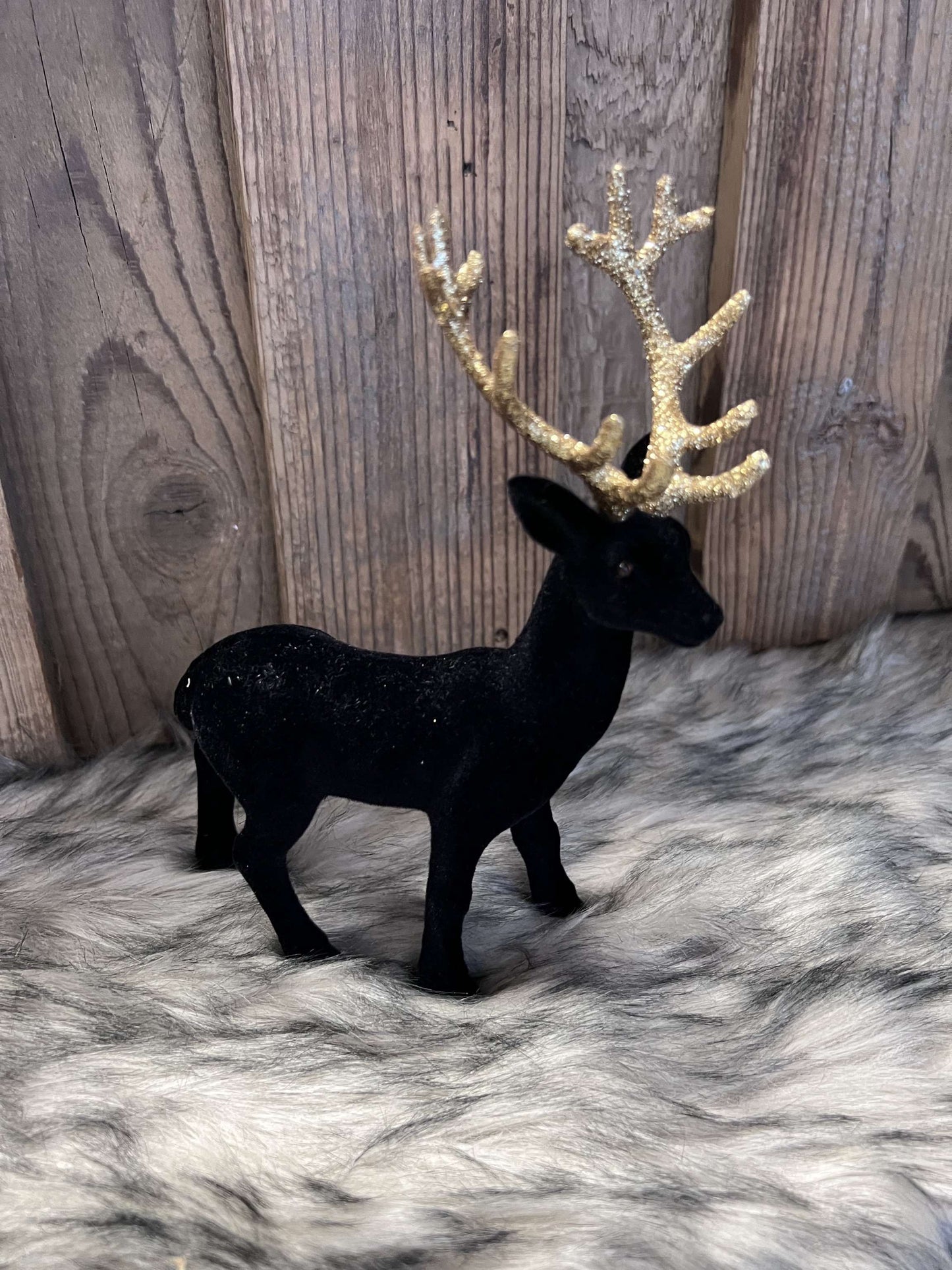Hirschfigur beflockt schwarz