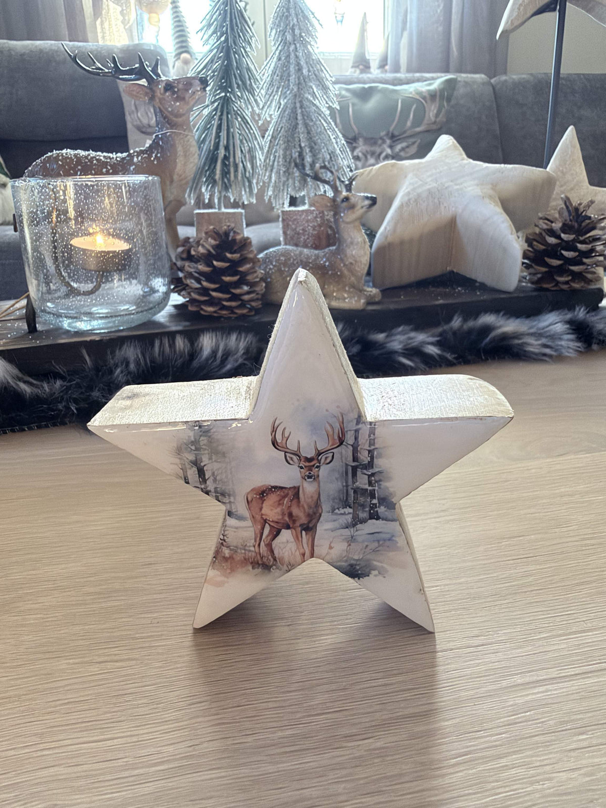 Holzstern mit Hirschmotiv