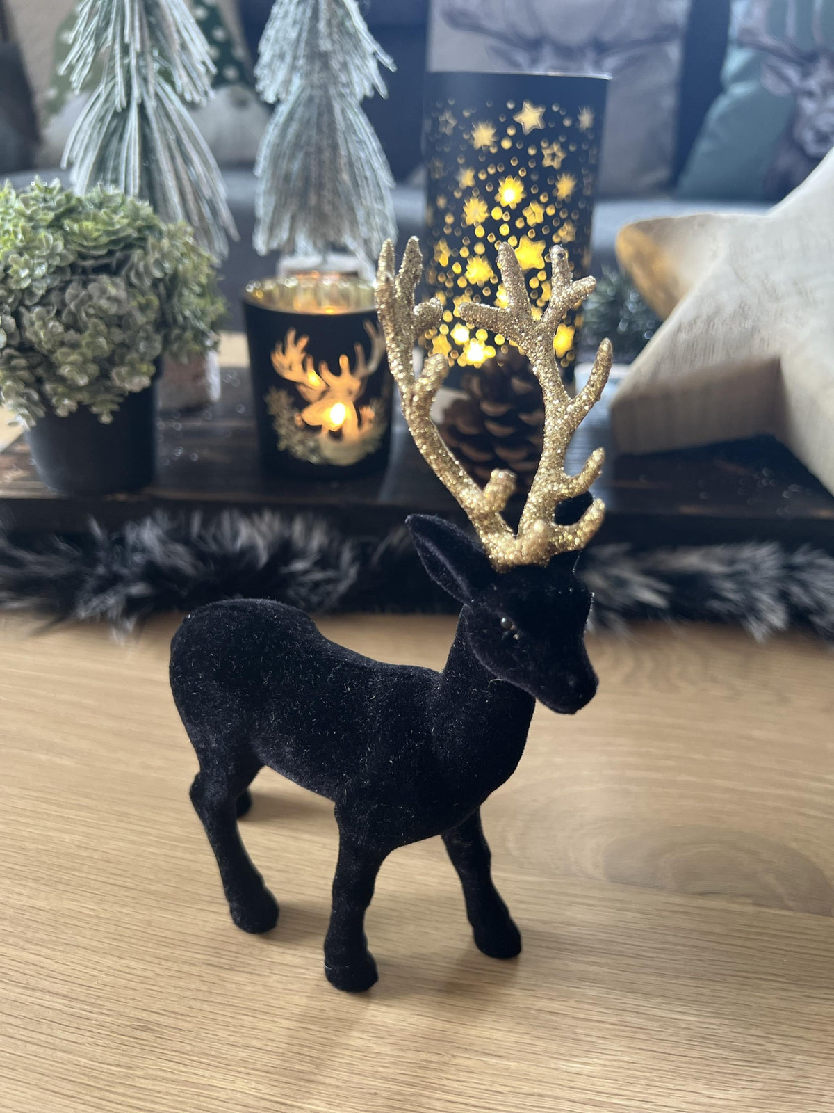 Hirschfigur beflockt schwarz