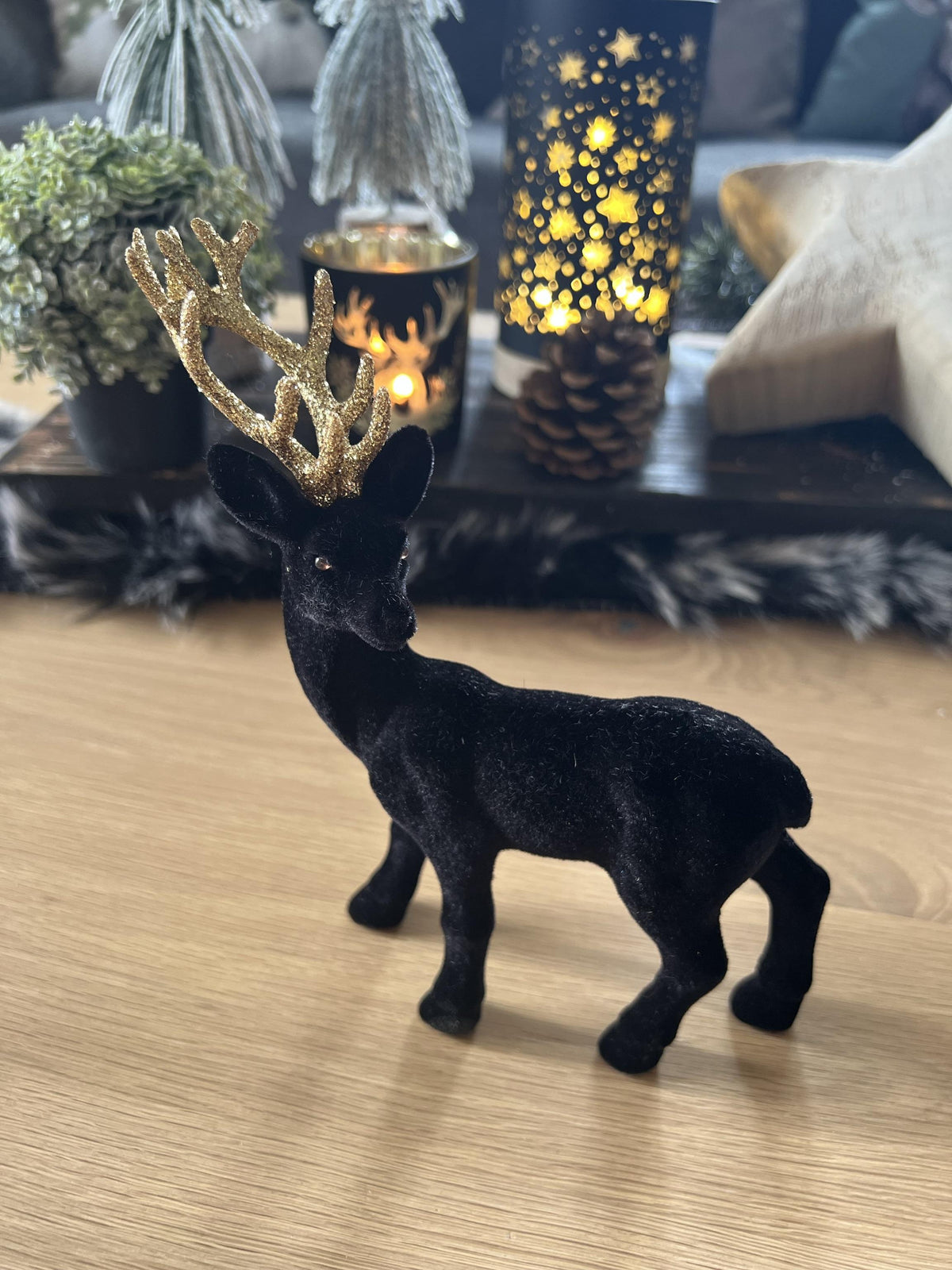 Hirschfigur beflockt schwarz