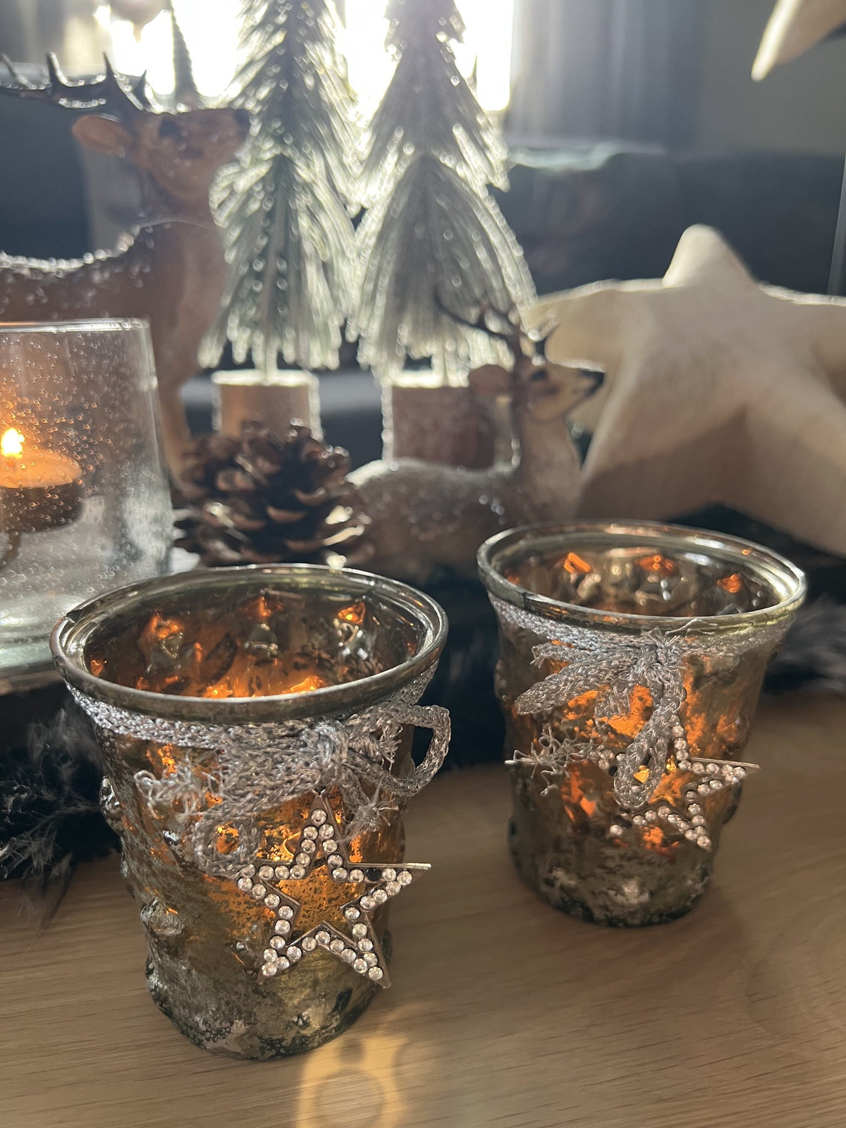 Windlicht aus Glas mit Sternanhänger