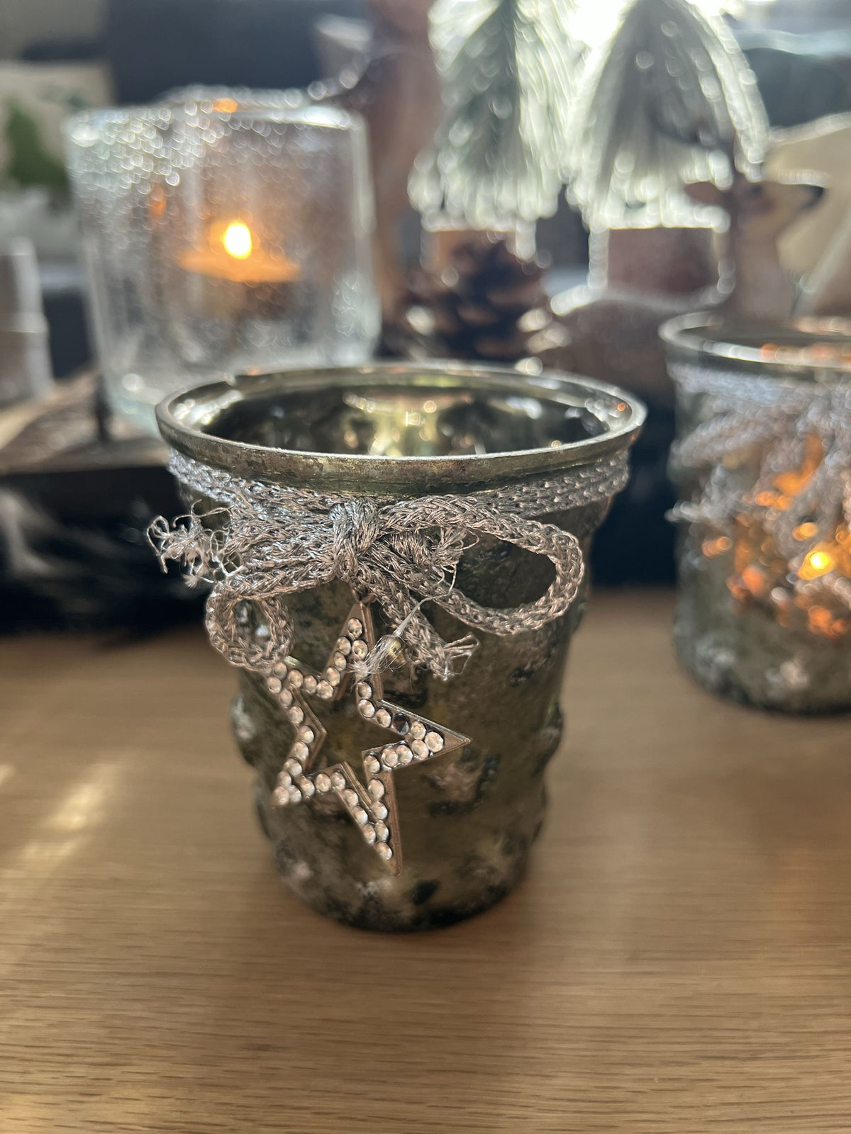 Windlicht aus Glas mit Sternanhänger