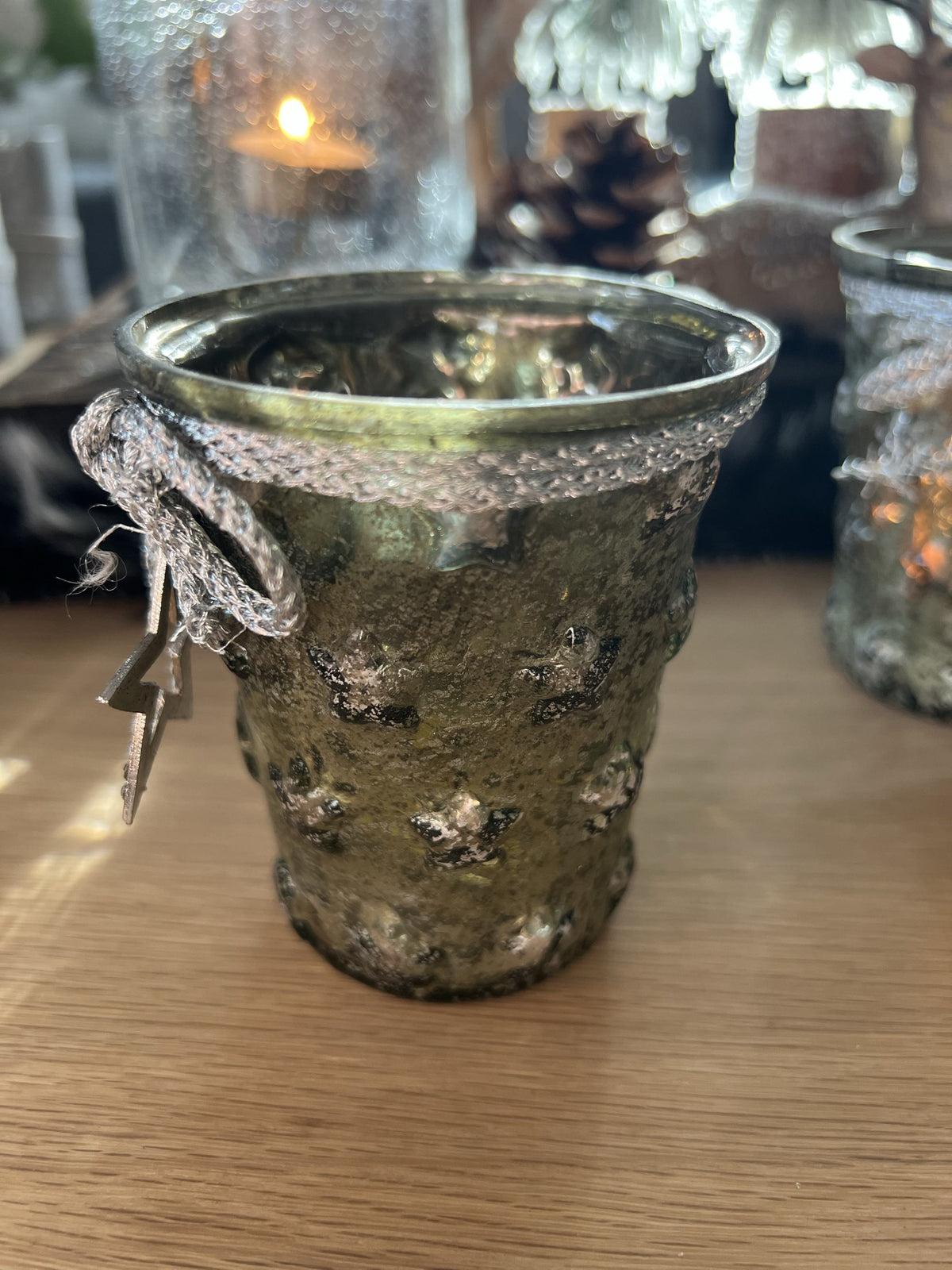 Windlicht aus Glas mit Sternanhänger